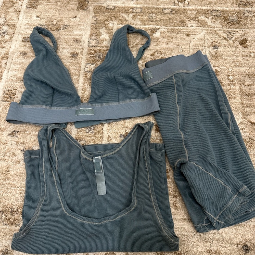 SKIMS Blue Shapewear tank, biker shorts, and bralette